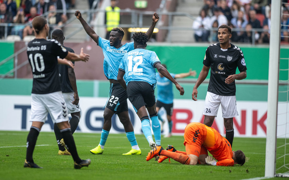 Victor Boniface celebrates his debut goal for Bayer Leverkusen against FC Teutonia